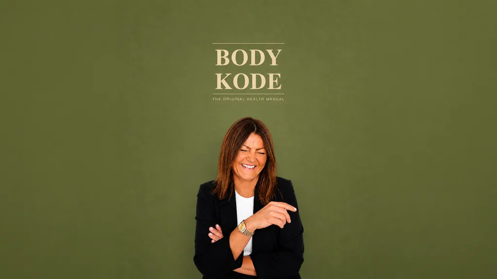 Kasia Wheeler in front of the BodyKode logo